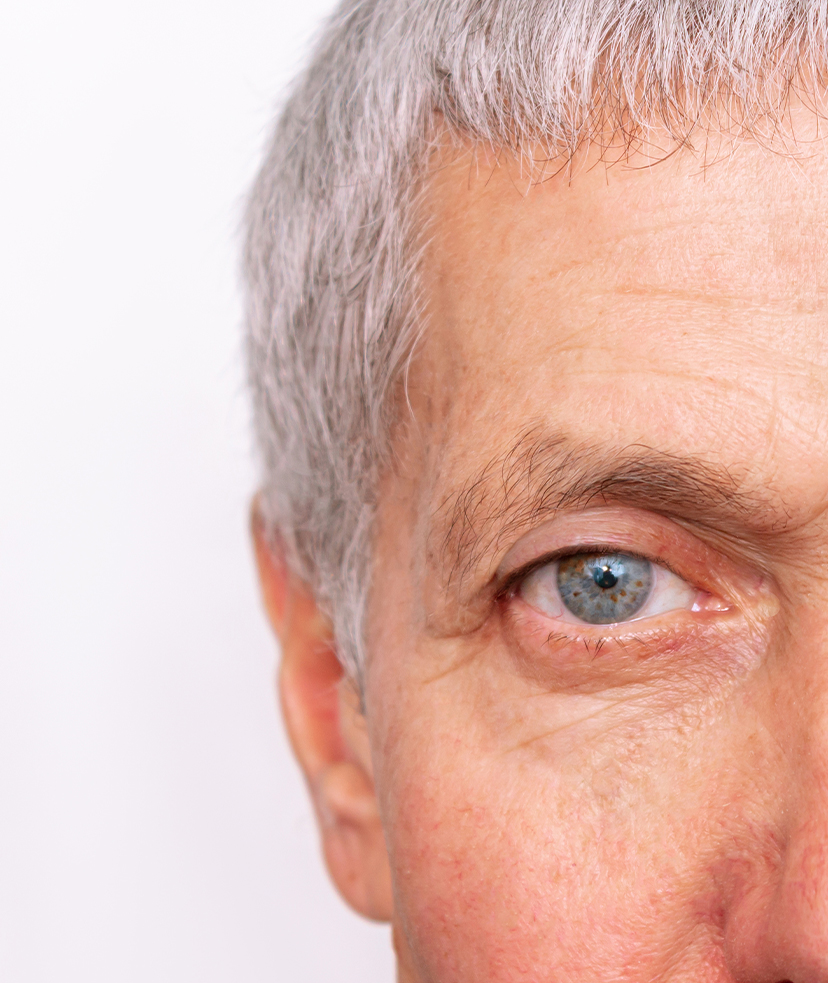 Photo of an older man's blue eye