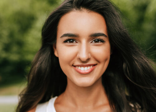 Photo of a smiling woman with great skin